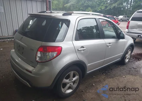 2009 Suzuki Sx4 Touring z USA, uszkodzony, nr VIN JS2YB417896200835